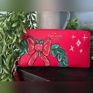 Kate Spade Red Wristlet with Bow Design